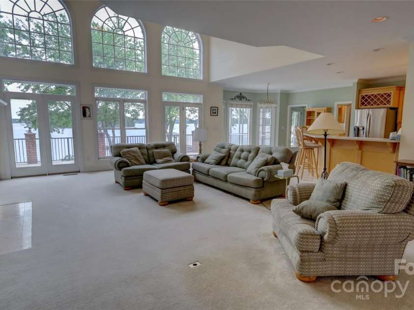 495 Bay Harbour Road, Mooresville, NC 28117.  MLS# CAR4256426, YatesRealty ID 15514. Two Story Greatroom with waterviews