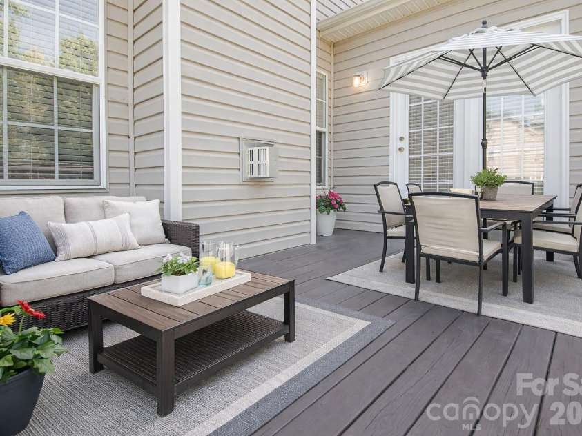 1325 Linden Glen Drive, Matthews, NC 28104.  MLS# CAR4370381, YatesRealty ID 15517. Back deck was just recently painted.  This room was just recently staged.  