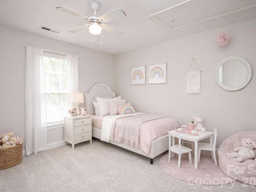 1325 Linden Glen Drive, Matthews, NC 28104.  MLS# CAR4370381, YatesRealty ID 15517. Bedroom 2.  This room has been virtually staged.  Look how cute it could become.