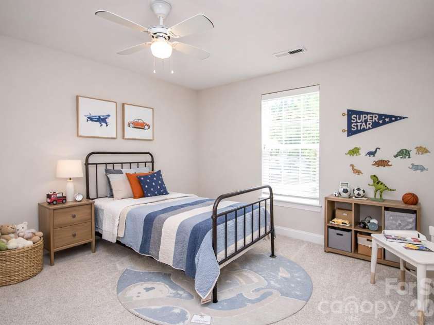 1325 Linden Glen Drive, Matthews, NC 28104.  MLS# CAR4370381, YatesRealty ID 15517. Bedroom 3.  This room has been virtually staged.  