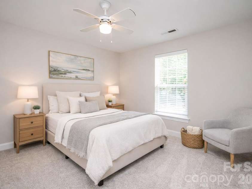 1325 Linden Glen Drive, Matthews, NC 28104.  MLS# CAR4370381, YatesRealty ID 15517. Bedroom 4 has ceiling fan, good size closet and it has been virtually staged.  