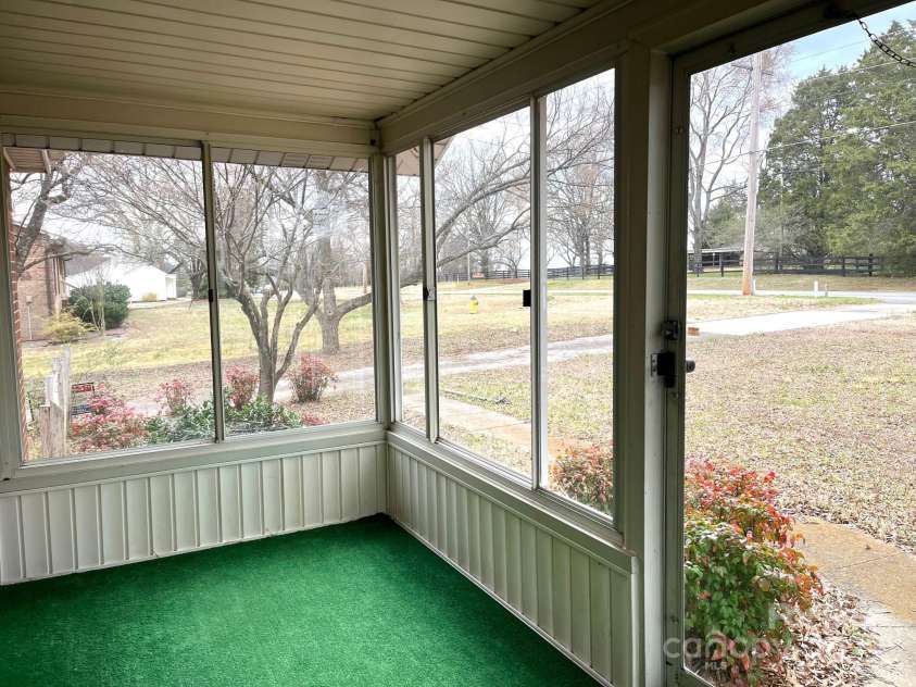 4137 Poplar Tent Road, Concord, NC 28027.  MLS# CAR4230433, YatesRealty ID 1552. Enclosed front porch