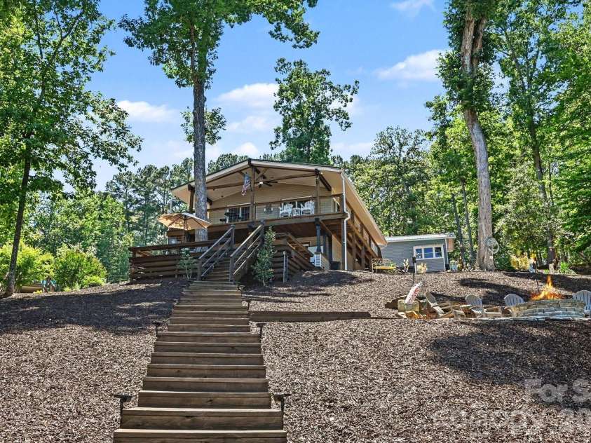 512 Deerfield Road, Mount Gilead, NC 27306.  MLS# CAR4390413, YatesRealty ID 15524. Facing up from the Lake