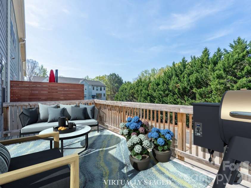 15132 Rocky Bluff Loop, Davidson, NC 28036.  MLS# CAR4351498, YatesRealty ID 15525. Back deck Virtually Staged
