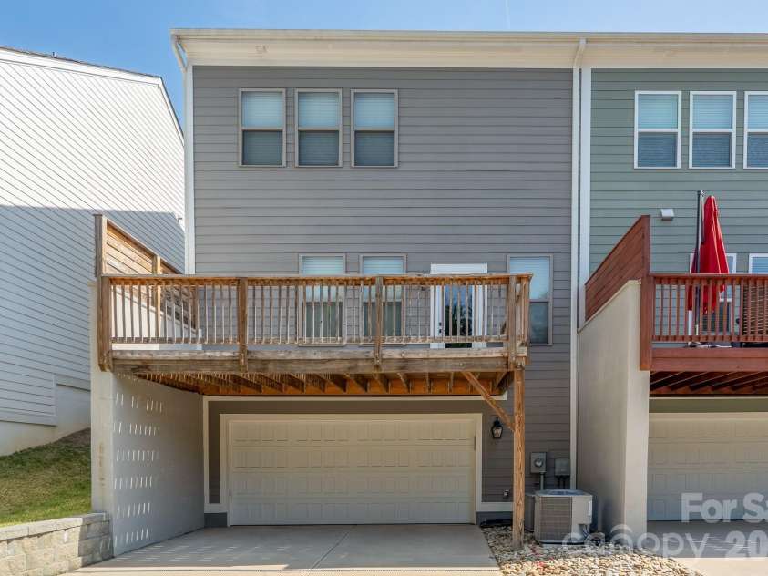 15132 Rocky Bluff Loop, Davidson, NC 28036.  MLS# CAR4351498, YatesRealty ID 15525. Back garage view