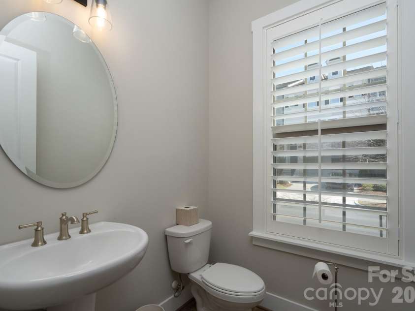 15132 Rocky Bluff Loop, Davidson, NC 28036.  MLS# CAR4351498, YatesRealty ID 15525. Main floor half bath