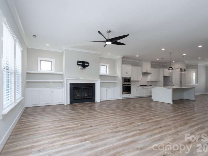 15132 Rocky Bluff Loop, Davidson, NC 28036.  MLS# CAR4351498, YatesRealty ID 15525. Open living, kitchen, and dining