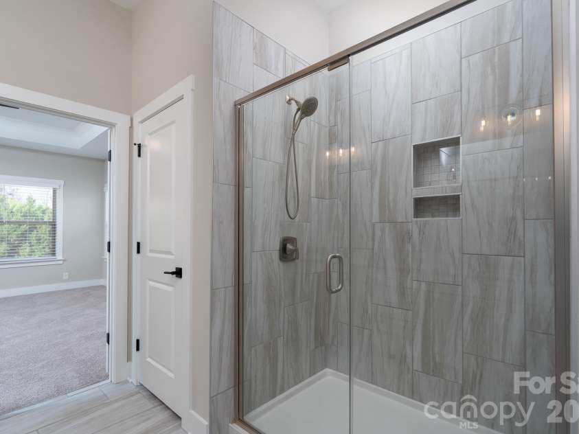 15132 Rocky Bluff Loop, Davidson, NC 28036.  MLS# CAR4351498, YatesRealty ID 15525. Primary walk in shower
