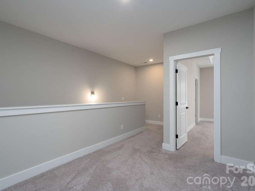 15132 Rocky Bluff Loop, Davidson, NC 28036.  MLS# CAR4351498, YatesRealty ID 15525. Upper level flex space