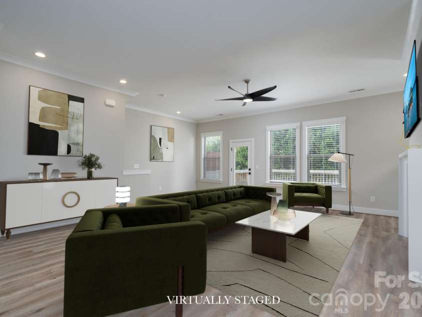 15132 Rocky Bluff Loop, Davidson, NC 28036.  MLS# CAR4351498, YatesRealty ID 15525. Virtually Staged Living room with fireplace