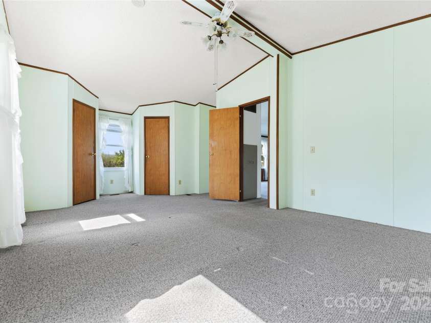 112 Melody Street, Clyde, NC 28721.  MLS# CAR4301909, YatesRealty ID 15527. Primary Bedroom