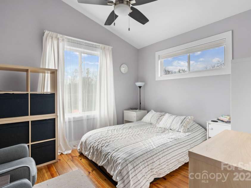 366 State Street, Asheville, NC 28806.  MLS# CAR4205001, YatesRealty ID 15530. Primary bedroom,vaulted ceiling, hardwood floors, walk-in-closet and lofted storage area