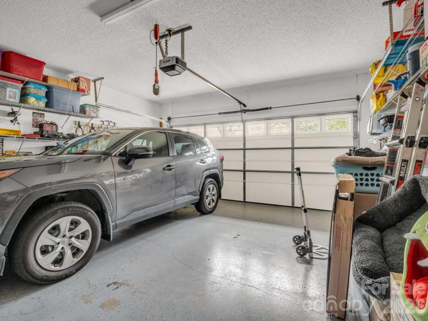 27 Gray Wolf Lane, Hendersonville, NC 28792.  MLS# CAR4285060, YatesRealty ID 15536. Garage w/Epoxy Flooring