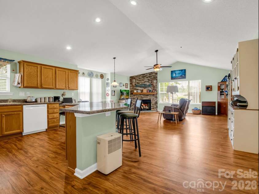 27 Gray Wolf Lane, Hendersonville, NC 28792.  MLS# CAR4285060, YatesRealty ID 15536. Open Kitchen/Dining/Living Area