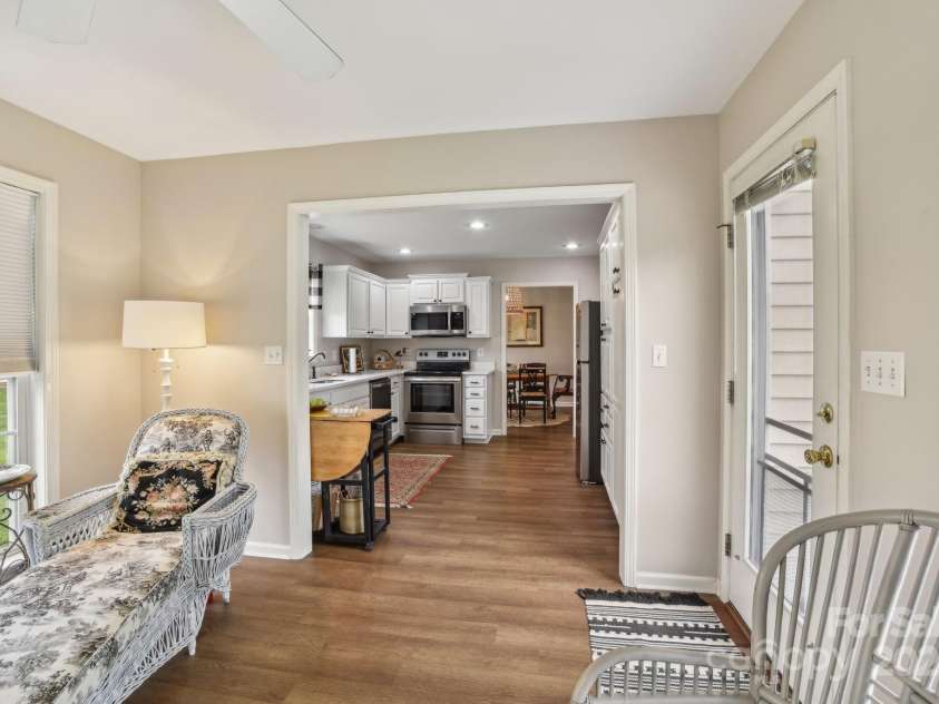 36 Planters Creek Road, Fletcher, NC 28732.  MLS# CAR4257762, YatesRealty ID 15540. Easy access from the sunroom to the kitchen and living spaces