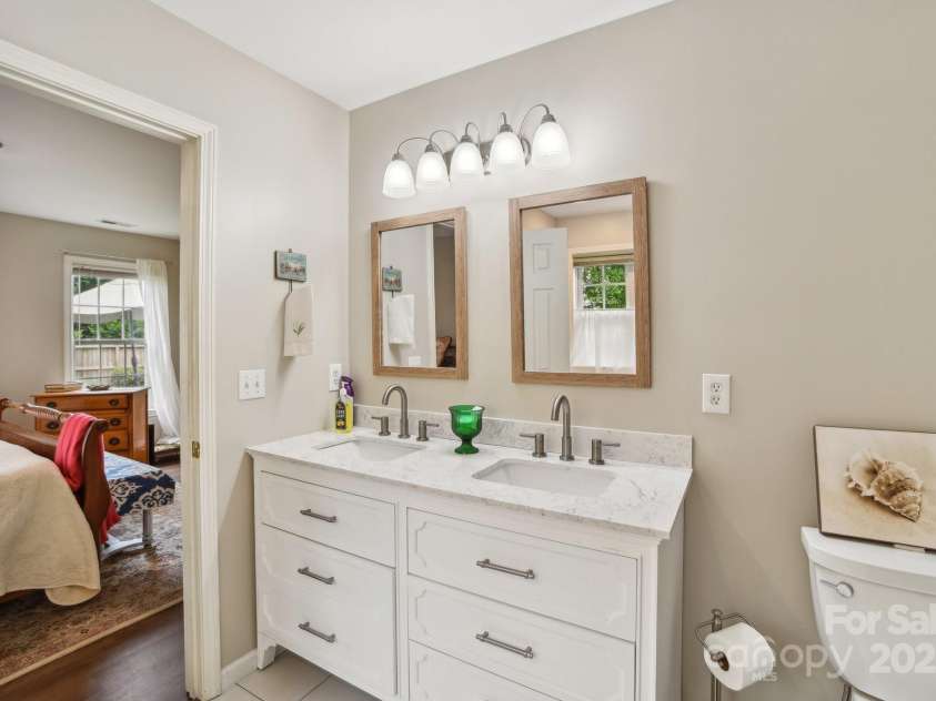 36 Planters Creek Road, Fletcher, NC 28732.  MLS# CAR4257762, YatesRealty ID 15540. En-suite bath is both sophisticated and serene