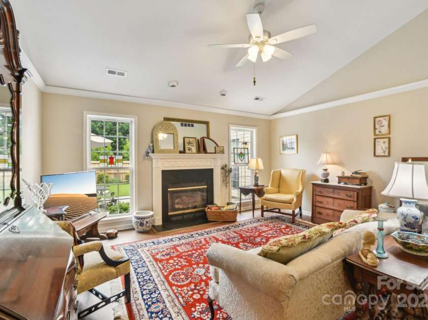 36 Planters Creek Road, Fletcher, NC 28732.  MLS# CAR4257762, YatesRealty ID 15540. Gather with friends and family around the fireplace