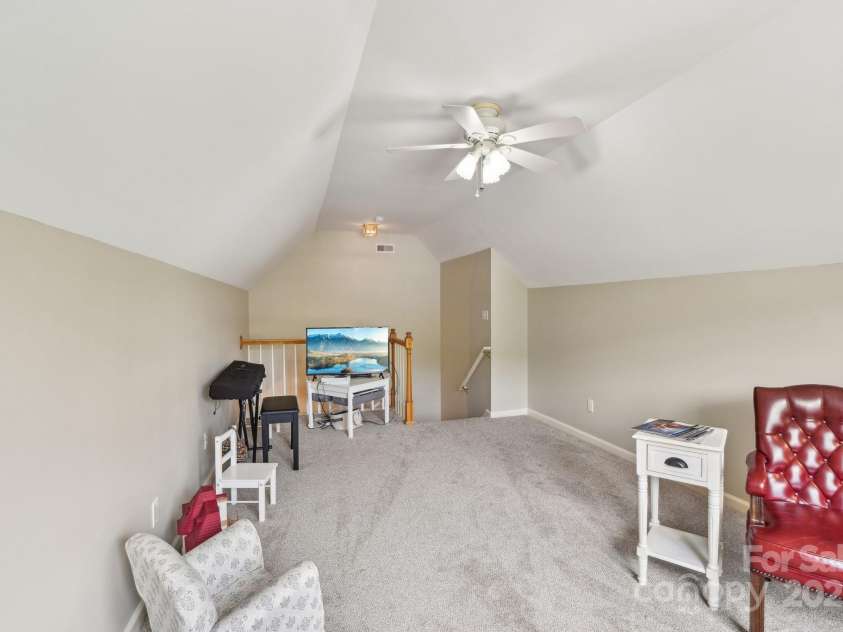 36 Planters Creek Road, Fletcher, NC 28732.  MLS# CAR4257762, YatesRealty ID 15540. Private space above the garage – ideal for an office, playroom, or guest room