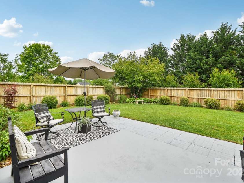 36 Planters Creek Road, Fletcher, NC 28732.  MLS# CAR4257762, YatesRealty ID 15540. Relax and entertain in style, surrounded by a lovely privacy fence