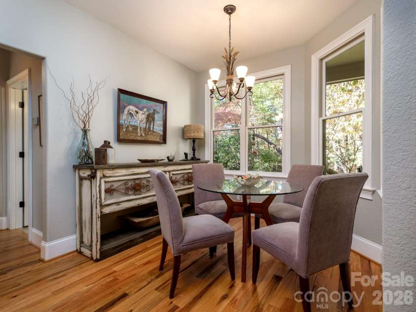 674 Soquili Drive, Brevard, NC 28712.  MLS# CAR4352829, YatesRealty ID 15540. Breakfast area beside kitchen