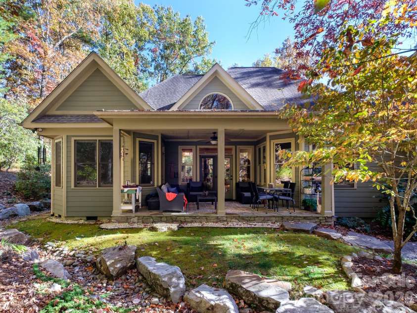 674 Soquili Drive, Brevard, NC 28712.  MLS# CAR4352829, YatesRealty ID 15540. Covered back porch