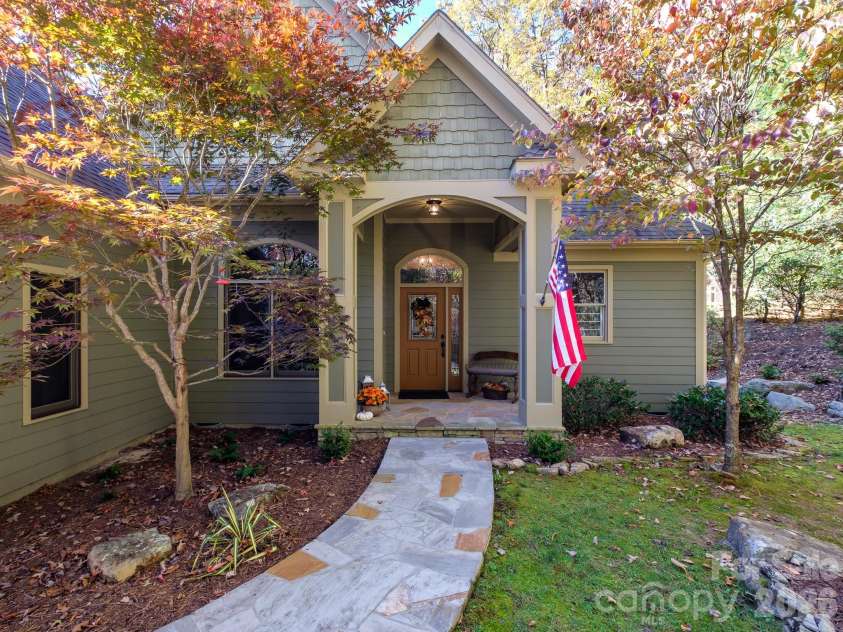 674 Soquili Drive, Brevard, NC 28712.  MLS# CAR4352829, YatesRealty ID 15540. Covered front porch