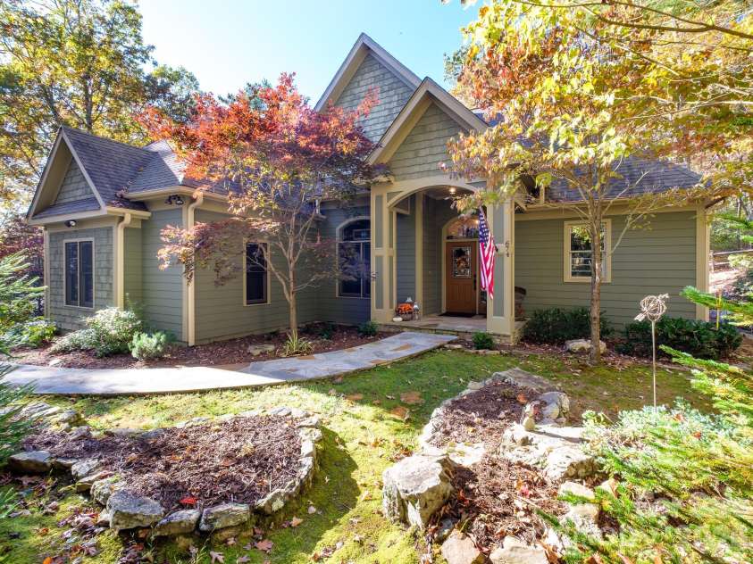 674 Soquili Drive, Brevard, NC 28712.  MLS# CAR4352829, YatesRealty ID 15540. Front door and side walk from the parking area