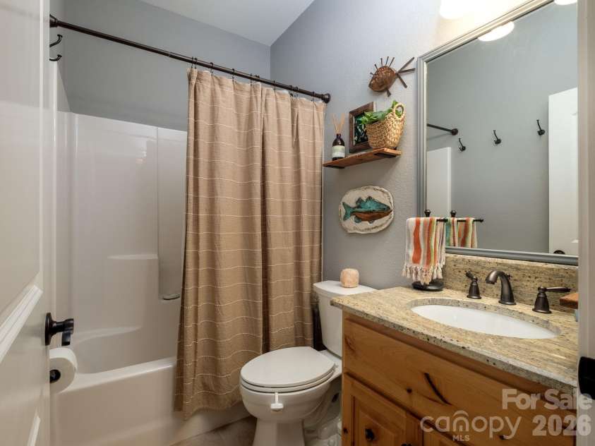 674 Soquili Drive, Brevard, NC 28712.  MLS# CAR4352829, YatesRealty ID 15540. Guest full bath