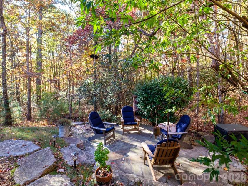 674 Soquili Drive, Brevard, NC 28712.  MLS# CAR4352829, YatesRealty ID 15540. Side patio