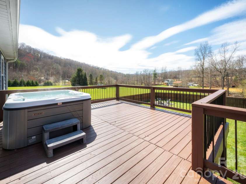 311 Hookers Gap Road, Candler, NC 28715.  MLS# CAR4358991, YatesRealty ID 15544. Expansive Back Deck with Mountain Views