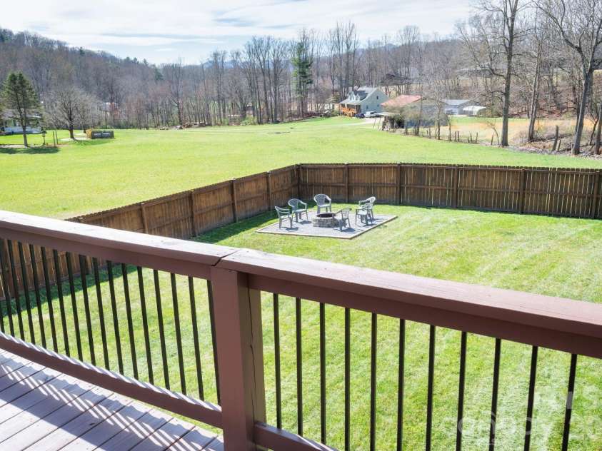311 Hookers Gap Road, Candler, NC 28715.  MLS# CAR4358991, YatesRealty ID 15544. Overlooks Spacious Yard