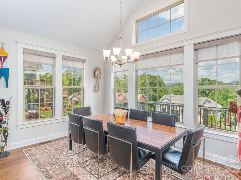 5 Buckhorn Gap Road, Biltmore Lake, NC 28715.  MLS# CAR4261479, YatesRealty ID 15544. Dining area with abundant light and views