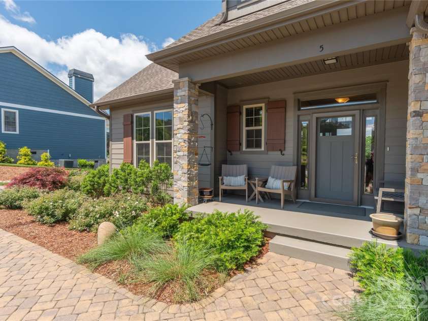 5 Buckhorn Gap Road, Biltmore Lake, NC 28715.  MLS# CAR4261479, YatesRealty ID 15544. Enjoy covered front porch and 2 step entry