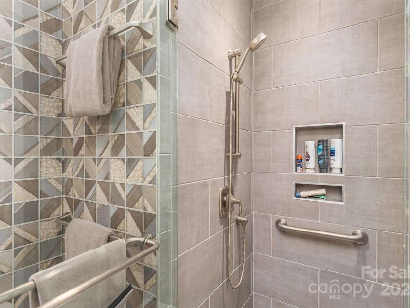 5 Buckhorn Gap Road, Biltmore Lake, NC 28715.  MLS# CAR4261479, YatesRealty ID 15544. Secondary bathroom with walk-in shower