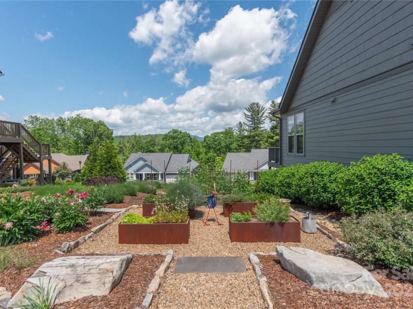 5 Buckhorn Gap Road, Biltmore Lake, NC 28715.  MLS# CAR4261479, YatesRealty ID 15544. The gardens!