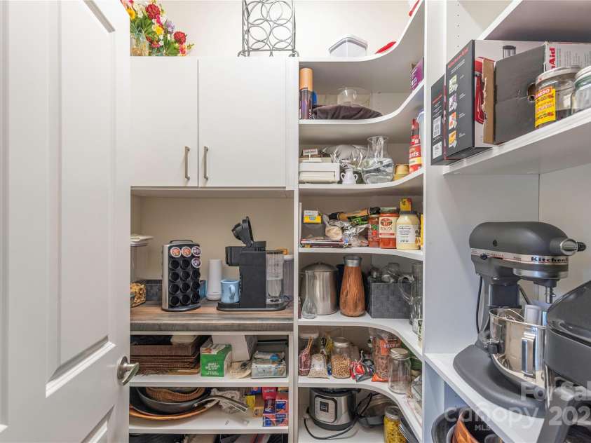 5 Buckhorn Gap Road, Biltmore Lake, NC 28715.  MLS# CAR4261479, YatesRealty ID 15544. Walk in pantry and coffee station