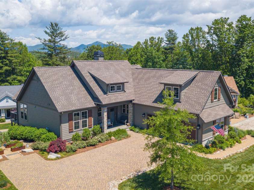 5 Buckhorn Gap Road, Biltmore Lake, NC 28715.  MLS# CAR4261479, YatesRealty ID 15544. Welcome to this exquisite home at 5 Buckhorn Gap Road in Biltmore Lake