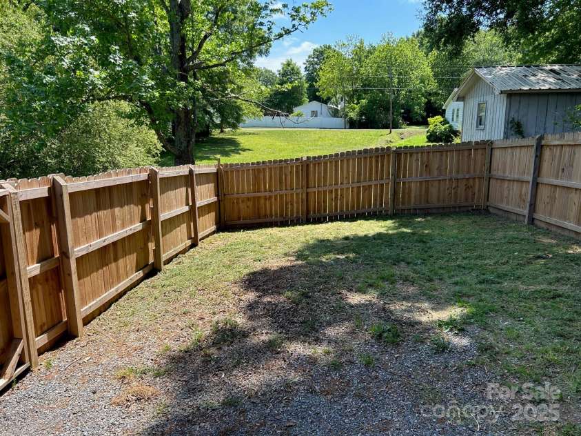 121 11th Street, Oakboro, NC 28129.  MLS# CAR4247731, YatesRealty ID 15547. Fenced Bachyard