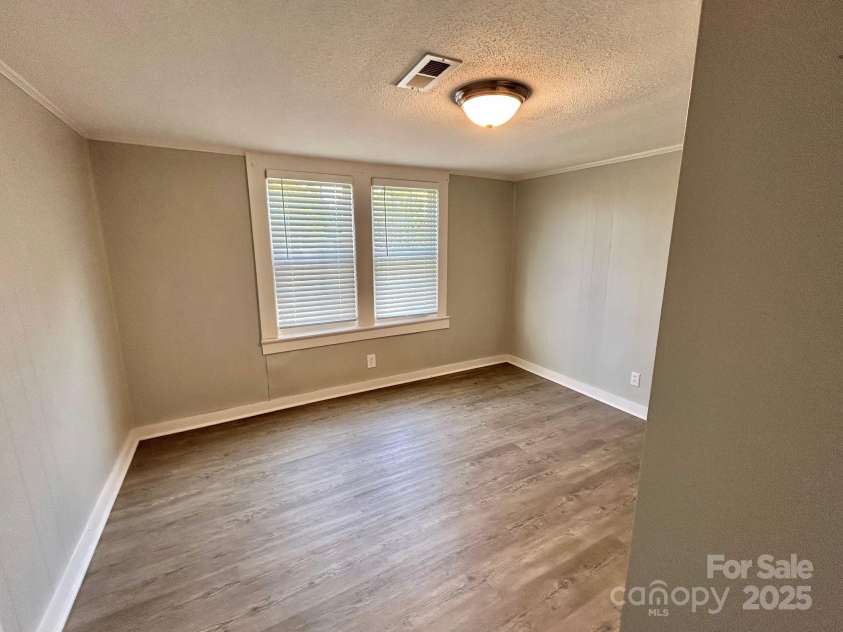 121 11th Street, Oakboro, NC 28129.  MLS# CAR4247731, YatesRealty ID 15547. Upstairs Bedroom