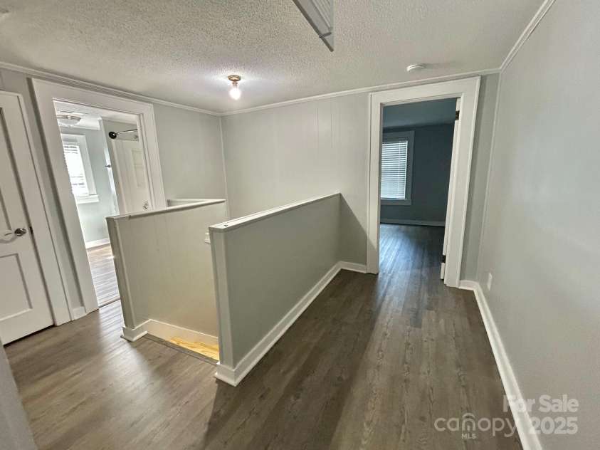 121 11th Street, Oakboro, NC 28129.  MLS# CAR4247731, YatesRealty ID 15547. Upstairs Steps and Landing