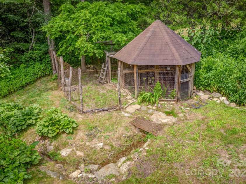 8749 Nc 63 Highway, Leicester, NC 28748.  MLS# CAR4214996, YatesRealty ID 1555. Chicken coop with 8749