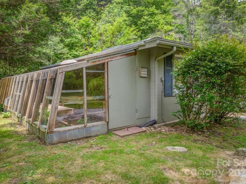 8749 Nc 63 Highway, Leicester, NC 28748.  MLS# CAR4214996, YatesRealty ID 1555. Greenhouse with 8749