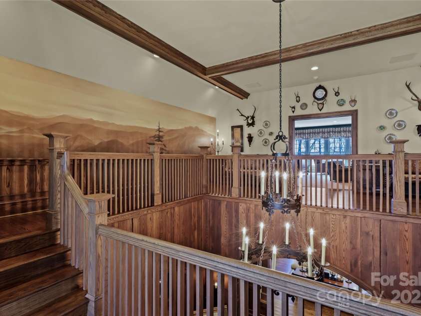 205 Indrio Road, Blowing Rock, NC 28605.  MLS# CAR4245602, YatesRealty ID 15556. 2 custom murals decorate the 2nd floor landing