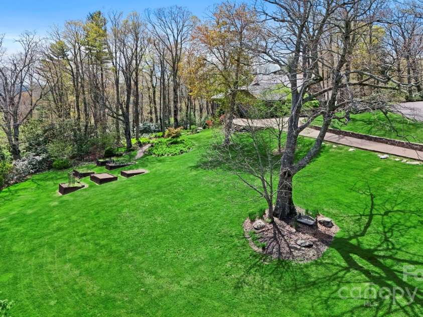 205 Indrio Road, Blowing Rock, NC 28605.  MLS# CAR4245602, YatesRealty ID 15556. 3 lots = great yards, gardens, level driveway