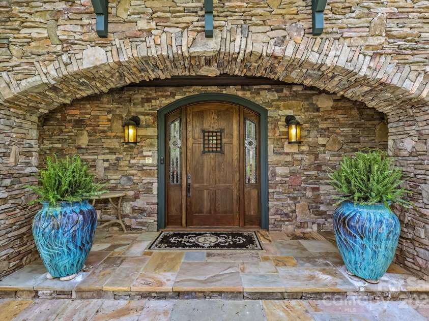 205 Indrio Road, Blowing Rock, NC 28605.  MLS# CAR4245602, YatesRealty ID 15556. Exquisite Stonework creating a welcoming entrance