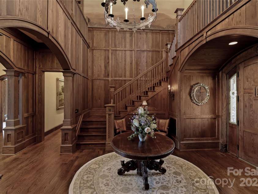 205 Indrio Road, Blowing Rock, NC 28605.  MLS# CAR4245602, YatesRealty ID 15556. Grand staircase to 2nd level