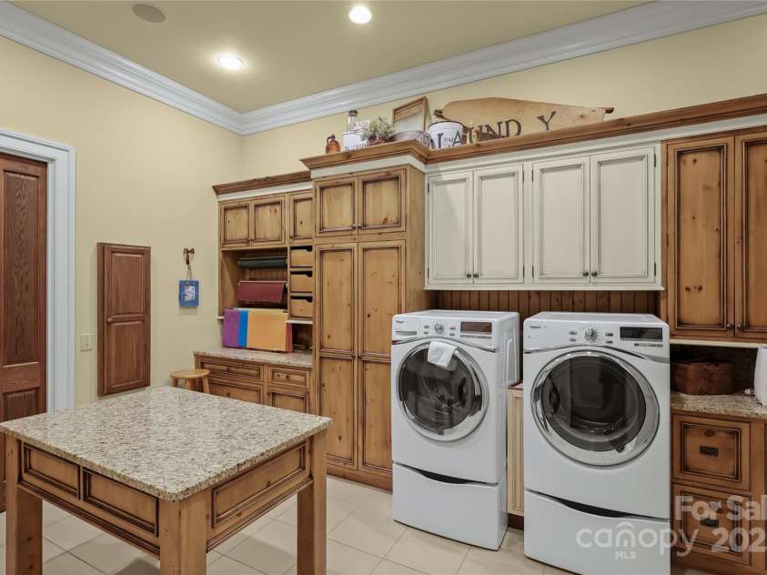 205 Indrio Road, Blowing Rock, NC 28605.  MLS# CAR4245602, YatesRealty ID 15556. Laundry, Wrapping, etc, in Primary Suite Wing