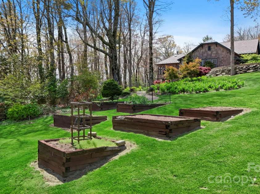 205 Indrio Road, Blowing Rock, NC 28605.  MLS# CAR4245602, YatesRealty ID 15556. Raised garden beds