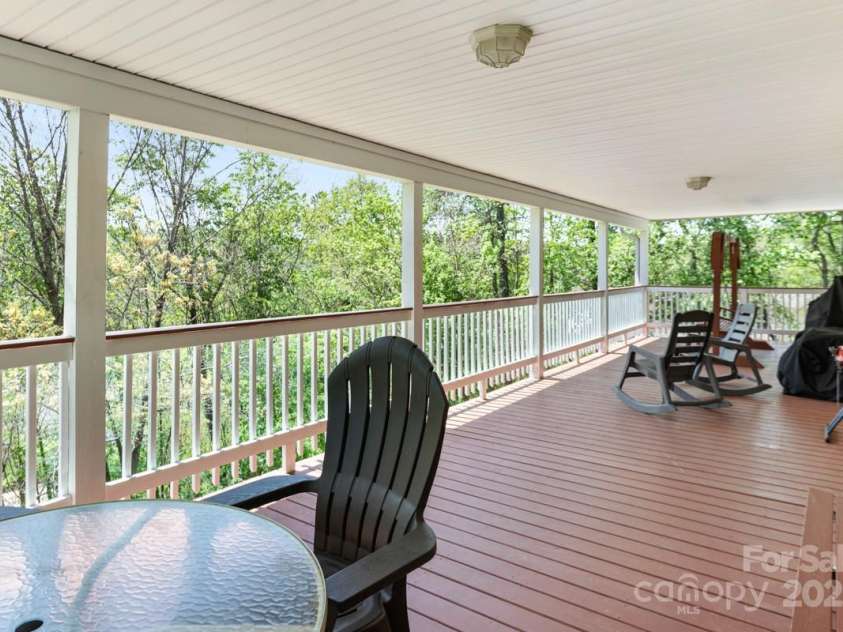 349 Penland Street, Clyde, NC 28721.  MLS# CAR4253328, YatesRealty ID 15558. Covered deck lives like multiple outdoor rooms