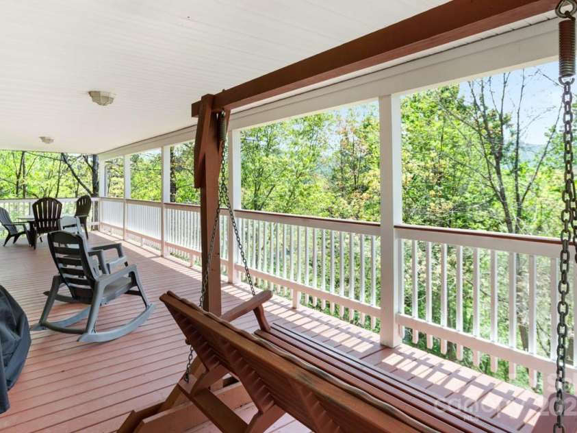 349 Penland Street, Clyde, NC 28721.  MLS# CAR4253328, YatesRealty ID 15558. Incredible covered deck